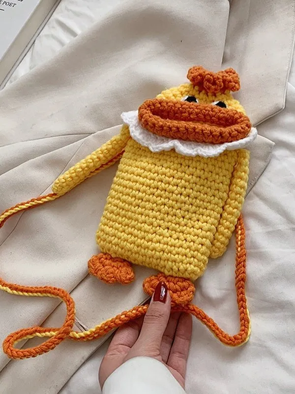Bolso bandolera de teléfono de dibujos animados de punto de ganchillo hecho a mano
