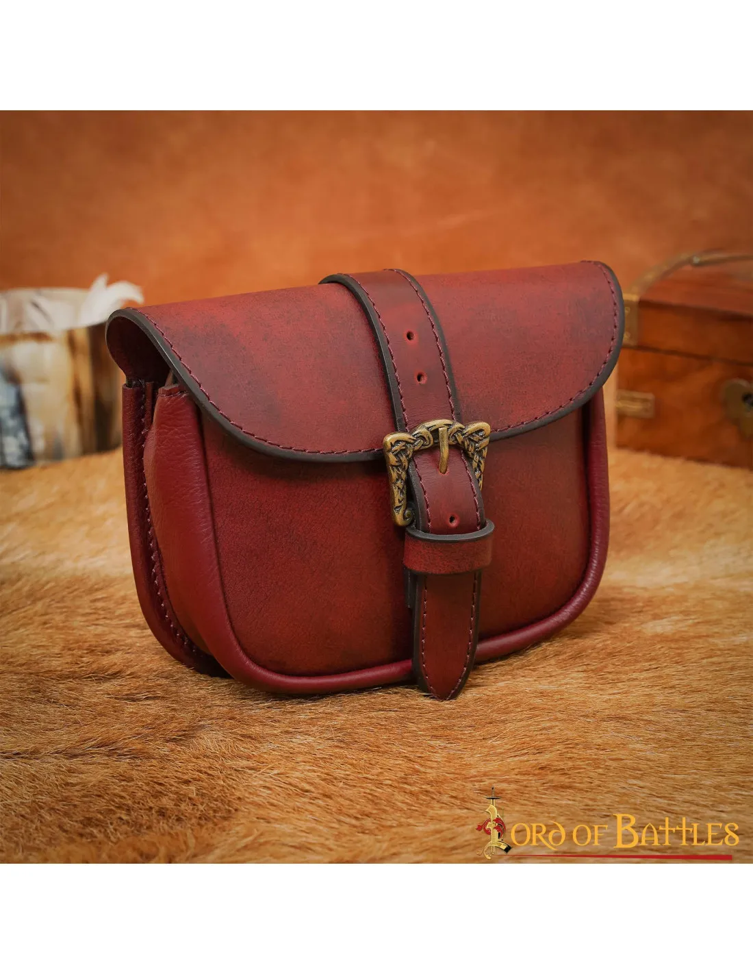 Bolso de cuero con hebilla Celta de latón, acabado rojizo