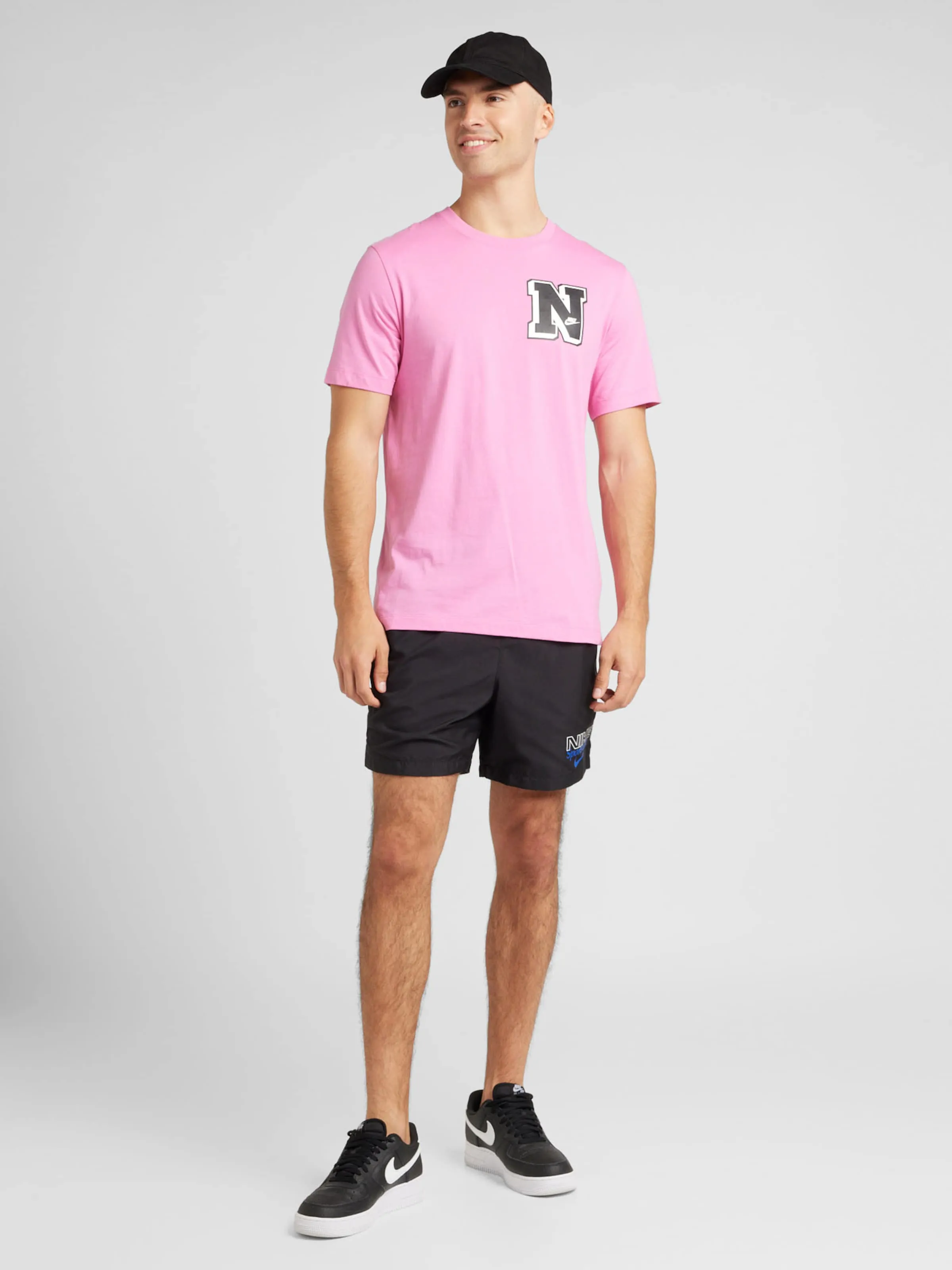 Camiseta 'CLUB' Nike Sportswear en Rosa
