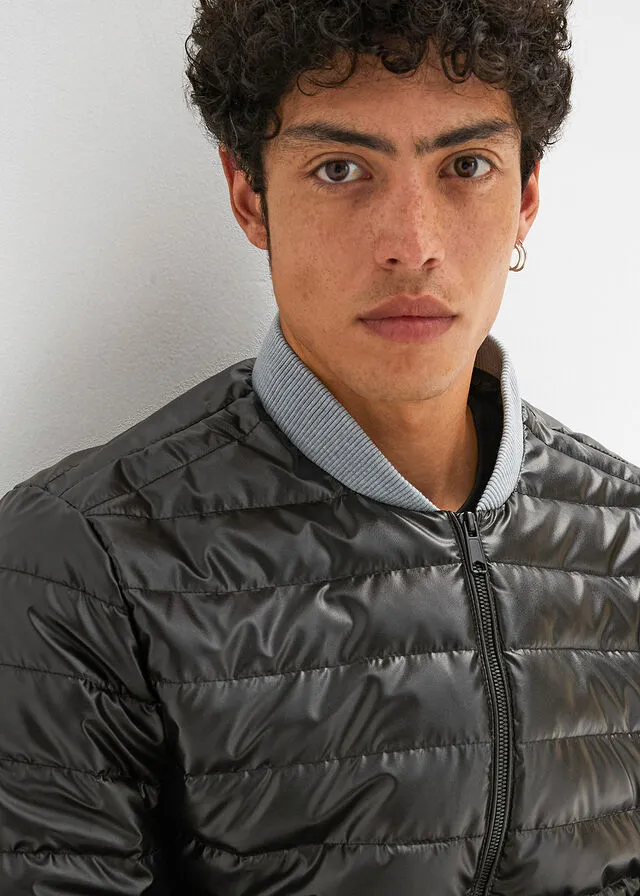 CHAQUETA GUATEADA NEGROGRIS CLARO JASPEADO
