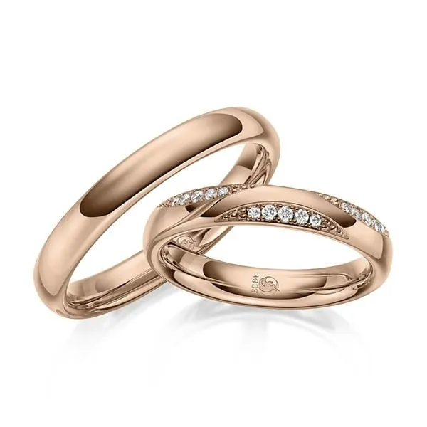 Diseño especial de anillos de boda de oro rosa con varios diamantes