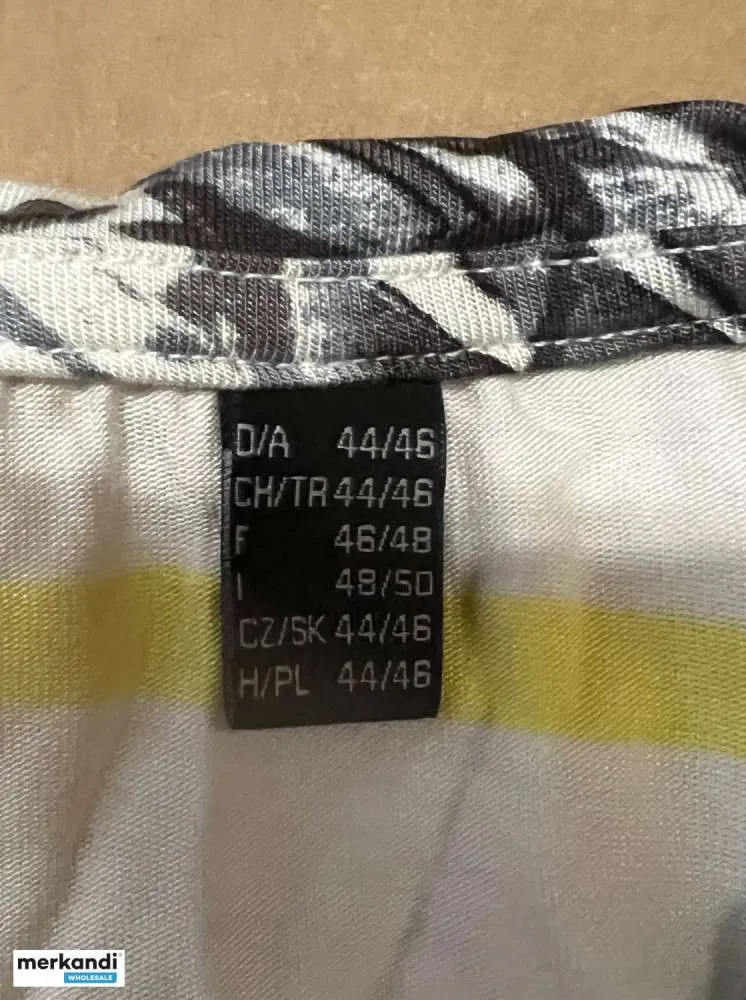 SOLO EXPORTACIÓN: KILOGRAMOS DE ROPA  9 PALETAS  MEZCLA BUFANDAS / CAMISETAS PARA